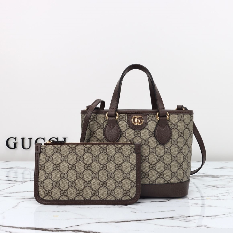 G*u*i shopping bags
